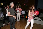 Lauren Vernon getting some bowling tips from Richard Gere at the Children's Advocacy Center of Manhattan's 8th. Annual Bowling Bowl at the Chelsea Pier on May 12, 2004. (photo by Rob Rich copyright 2004<br>516-676-3939)
