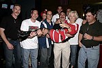 Cochair Lyn Paulsin with memebers of the NYFD at the Children's Advocacy Center of Manhattan's 8th. Annual Bowling Bowl at the Chelsea Pier on May 12, 2004. (photo by Rob Rich copyright 2004<br>516-676-3939)