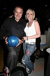 Larry and Michele Herbert  at the Children's Advocacy Center of Manhattan's 8th. Annual Bowling Bowl at the Chelsea Pier on May 12, 2004. (photo by Rob Rich copyright 2004<br>516-676-3939)