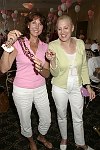 Displaying their fine jewels  at the Evelyn Lauder Breast Cancer Golf Tournament at Hampton Hills Golf Course in Westhamtpon on 8-5-04.<br>photo by Rob Rich copyright 2004 516-676-3939  robwayne1@aol.com