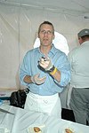 Adam Batcheller from the Village Cheese Shop   at the Peconic Bay Winery 3rd. Annual Thanksgiving Barrell Tasting on 11-21-04 in Cutchogue, N.Y., honoring Larry Forgione and benefitting the NYIT Culinary Arts Program.<br>photo by Rob Rich copyright 2004 516-676-3939 robwayne1@aol.com