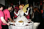 Lavina at the dessert table at the Volunteers of America fundraiser at the Boat House in  Central Park on June 8, 2004 in N.Y.C.<br>photo by Rob Rich copyright 2004<br>516-676-3939<br>robwayne1@aol.com