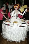 Lavina at the dessert table at the Volunteers of America fundraiser at the Boat House in  Central Park on June 8, 2004 in N.Y.C.<br>photo by Rob Rich copyright 2004<br>516-676-3939<br>robwayne1@aol.com