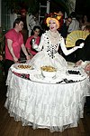 Lavina at the dessert table at the Volunteers of America fundraiser at the Boat House in  Central Park on June 8, 2004 in N.Y.C.<br>photo by Rob Rich copyright 2004<br>516-676-3939<br>robwayne1@aol.com
