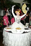 Lavina at the dessert table at the Volunteers of America fundraiser at the Boat House in  Central Park on June 8, 2004 in N.Y.C.<br>photo by Rob Rich copyright 2004<br>516-676-3939<br>robwayne1@aol.com