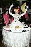 Lavina at the dessert table at the Volunteers of America fundraiser at the Boat House in  Central Park on June 8, 2004 in N.Y.C.<br>photo by Rob Rich copyright 2004<br>516-676-3939<br>robwayne1@aol.com