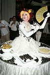 Lavina at the dessert table at the Volunteers of America fundraiser at the Boat House in  Central Park on June 8, 2004 in N.Y.C.<br>photo by Rob Rich copyright 2004<br>516-676-3939<br>robwayne1@aol.com