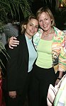 Guest and   Laura Scott (Prudential/Douglas Elliman)at the Volunteers of America fundraiser at the Boat House in  Central Park on June 8, 2004 in N.Y.C.<br>photo by Rob Rich copyright 2004<br>516-676-3939<br>robwayne1@aol.com